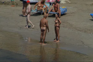 Girls on a nude beach in Sitges, Spain