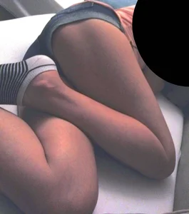 Girls lying in bed in shorts home pics