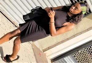 Sexy braless ebony babe in tight skirt with pokies