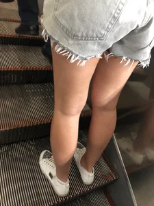 Hot Legs and Ass in Denim Fringe Shorts Escalator Closeup Creepshots