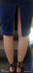Candid girls' legs closeups on the escalator