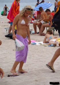 Beach voyeur girls in bikinis, thongs and topless