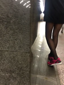 Girl in Black Pantyhose and a Skirt Subway Candid