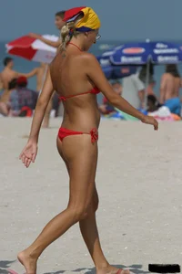 Beach voyeur girls in bikinis, thongs and topless