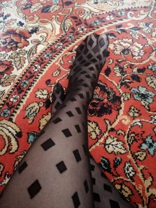 Legs in Black Pantyhose with Dots - Girl Sitting on the Floor Selfie Closeup