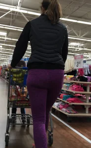 Milf shopping with a nice ass in purple leggings