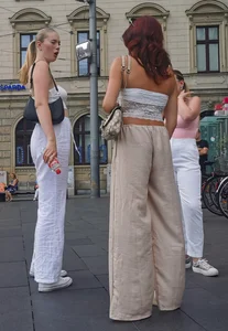 Long blonde braless in a white outfit (many pictures)