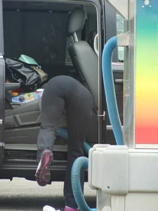 Girls cleaning their cars in jeans and pants