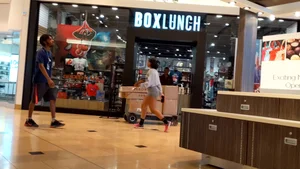 Candid ebony babe with an amazing ass and vpl in grey Nike spandex shorts