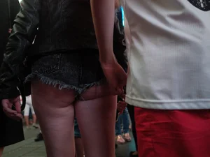 Girl in NYC showing her ass cheeks in denim shorts