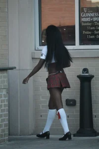 Sexy ebony Tilted Kilt employee in her uniform