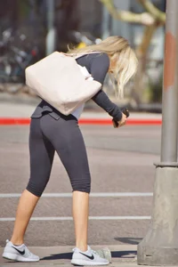 Skinny Blonde in Short Tights Bending Over on the Street to Pick Up Something on the Ground Sexy Candid Photos