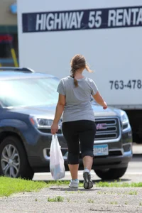 Thick girl out walking in black leggings