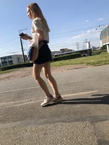 Cute Girl with Hot Legs in a Skirt Street Candid Gallery