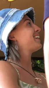 Tatted up hippie in short jean shorts with a nip slip