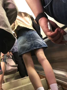 Girl in Denim Skirt with Thin Hot Legs in White Socks Subway Train and Escalator Creepshot