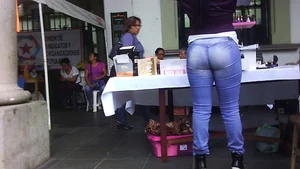 Big booty Latina lady in tight jeans with a round ass