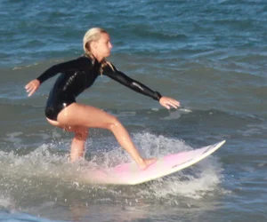 Hot surfer chicks out in the water