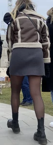 Street creepshots of a girl in a skirt and black pantyhose