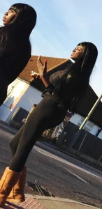 2 sexy black girls in leggings with nice asses
