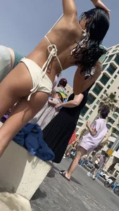 Skinny girl in a swimsuit at the beach
