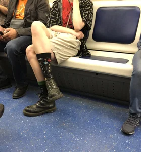 Girl in Military Boots and Shorts with Skinny Crossed Legs Subway Train Candid