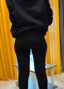 Candid chick wearing tight black jeans home closeups