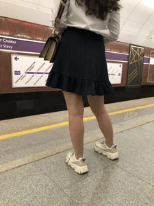 Girl in a Blouse And a Skirt With Great Legs Creepshots Gallery - Standing on the Subway Station, then Sitting With Crossed Legs in a Train