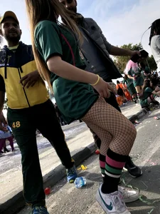 Teen girls in uniform - shorts, knee socks and fishnet pantyhose street creepshots