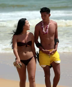Sexy Asian on the beach with nice boobs and ass