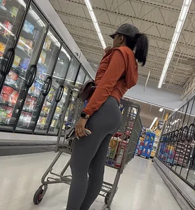 Ebony chick orange sweater + grey leggings