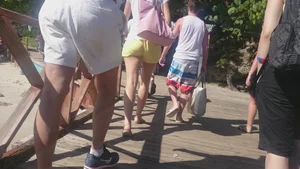 Milf in yellow shorts with vpl and a wedgie