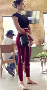Hottie in red leggings and sandals at a cafe creepshot, great long legs