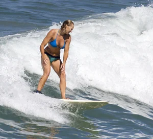 Candid surfer babes on the beach and in bikinis