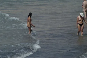 Girls on a nude beach in Sitges, Spain