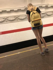 Cute Skinny Teen in Jean Mini Shorts Standing on the Subway Platform