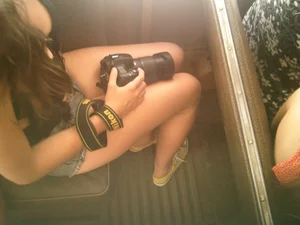 Sexy girl on the bus in jean shorts with nice legs and cleavage