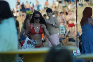 Amazing Girl in Red Swimsuit and Sunglasses with Small Breast Walking on the Beach Hot Creepshots