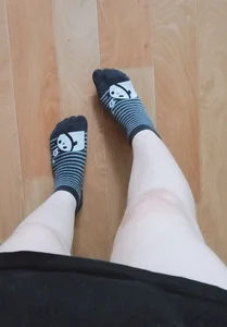 Legs with Pale Skin in Cute Socks Home Selfie