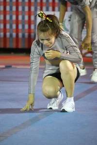 Bunch of athletic Thai cheerleaders at a competition
