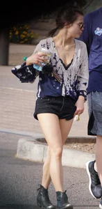 Cutie walking her dog in short denim shorts and showing a bit of cheek