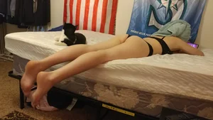Unsuspecting girls lying on stomach