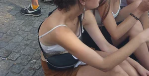 Pretty girl downbloused showing her puffy nipples and bonus friend with nice cleavage