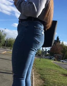 Long haired beauty teen with a tight ass in jeans