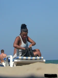 Hot ass topless beach girl with great tits lets her little brother oil up her ass in thong bikini