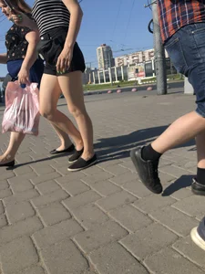 Candid teen in shorts with nice legs and booty street pics