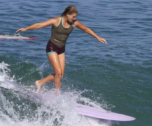 Candid surfer babes on the beach and in bikinis