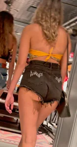 T33ns shopping denin short close up
