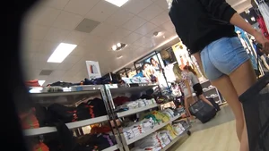 Blonde with a nice ass shopping in little jean shorts