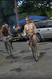 Nudist girls on bikes